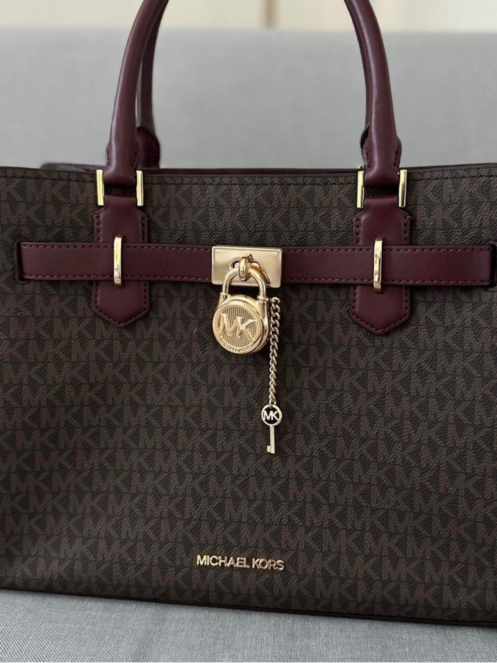 Michael Kors Brown Monogram Satchel with Burgundy Trim with matching wallet
